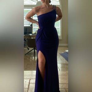 Evening gown in plum with beaded over the shoulder